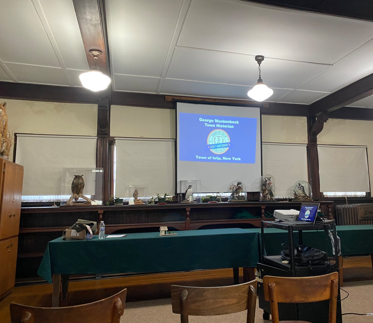 Reporter Mariana Dominguez attended a lecture from Islip Town historian George Munkenbeck.
